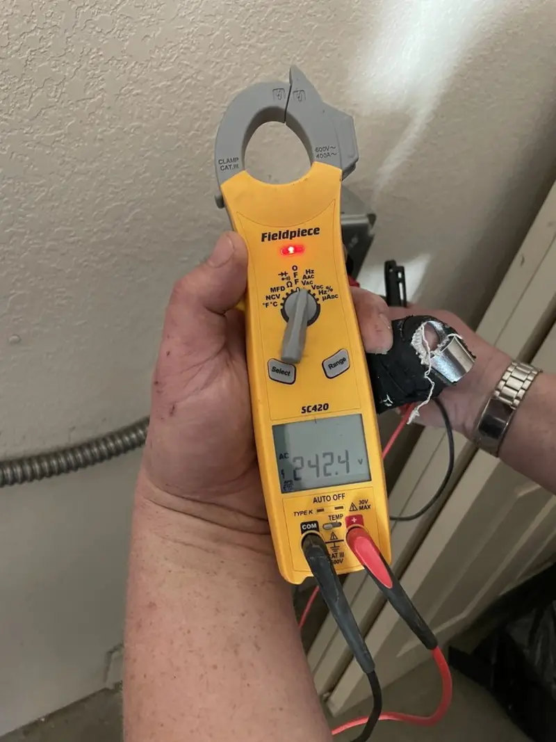 Voltage testing with clamp meter during Generator Installation in Ross